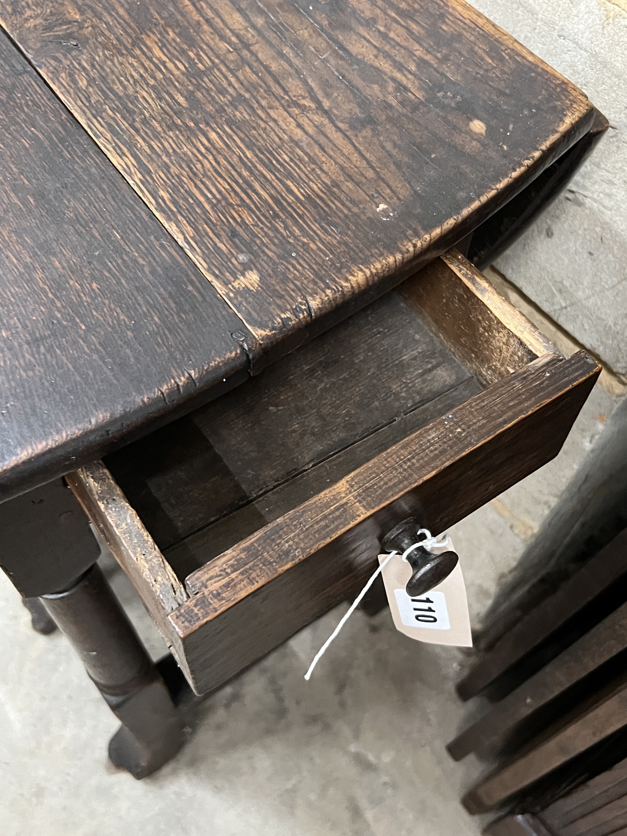 A small 18th century oak gateleg table, width 90cm, length 118cm extended, height 70cm